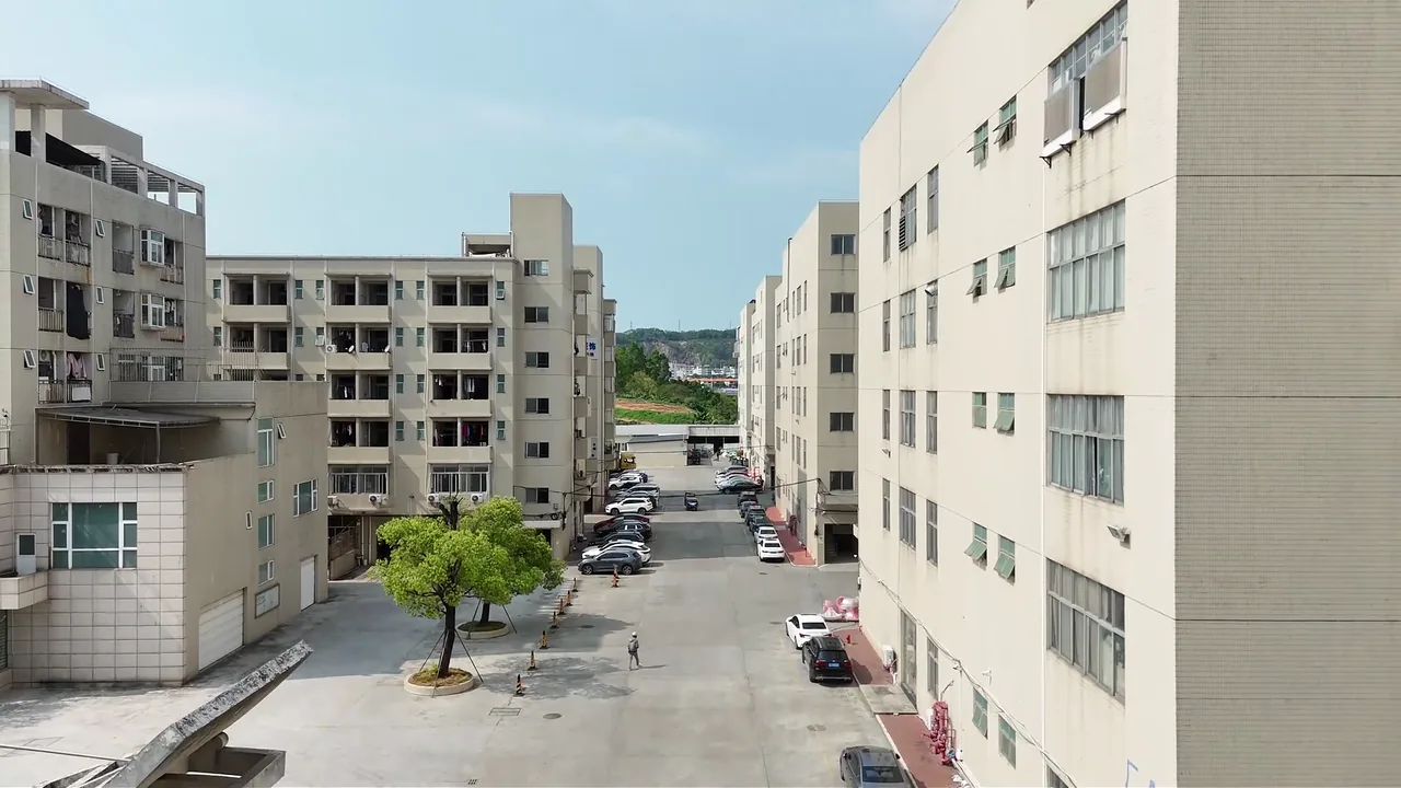 Opening frame of the YIDI company introduction video showing factory buildings and a courtyard.